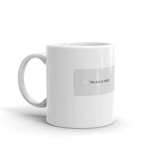 Load image into Gallery viewer, A mug with recaptcha UI that has an empty checkbox indicating the drinker is still a robot- photographed and designed by Nate DeWaele - 11oz handle on left view product