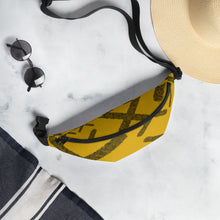 Load image into Gallery viewer, A yellow fanny pack with X shapes made from tiny black and negative space dots - designed by Nate DeWaele