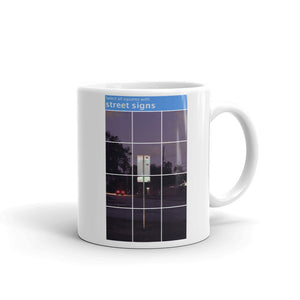 A mug with recaptcha image and direction to select squares with street signs - photographed and designed by Nate DeWaele - 11oz right side view of product